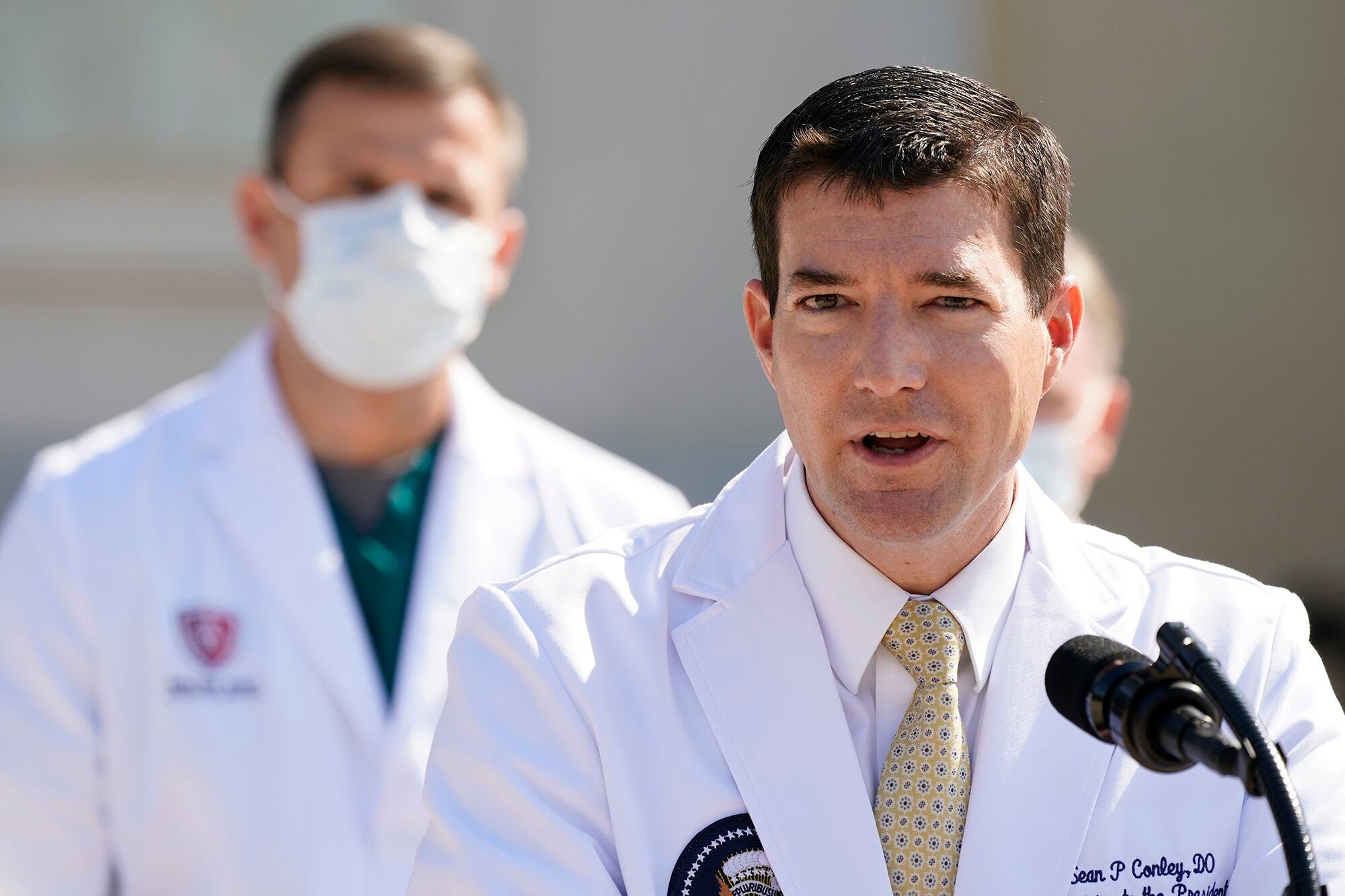 Dr. Sean Conley, physician to President Donald Trump, briefs reporters at Walter Reed National Military Medical Center in Bethesda, Md., Sunday, Oct. 4, 2020.