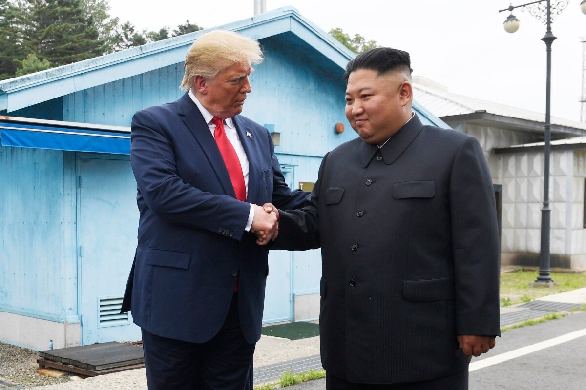 President Donald Trump meets with North Korean leader Kim Jong Un at the border village of Panmunjom in the Demilitarized Zone, South Korea, Sunday, June 30, 2019.