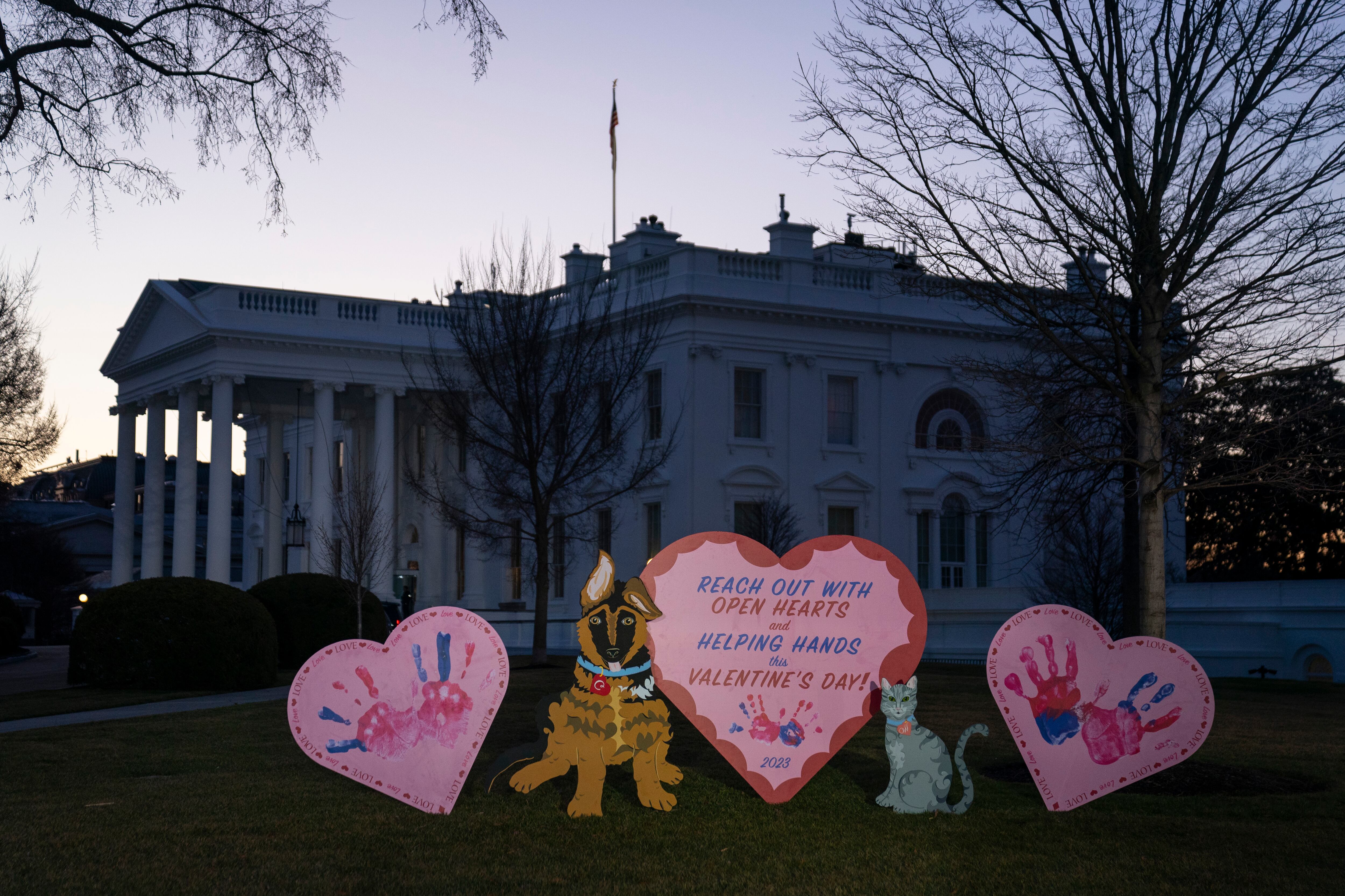 Valentine's Day decorations adorn the White House lawn, Tuesday, Feb. 14, 2023, in Washington.