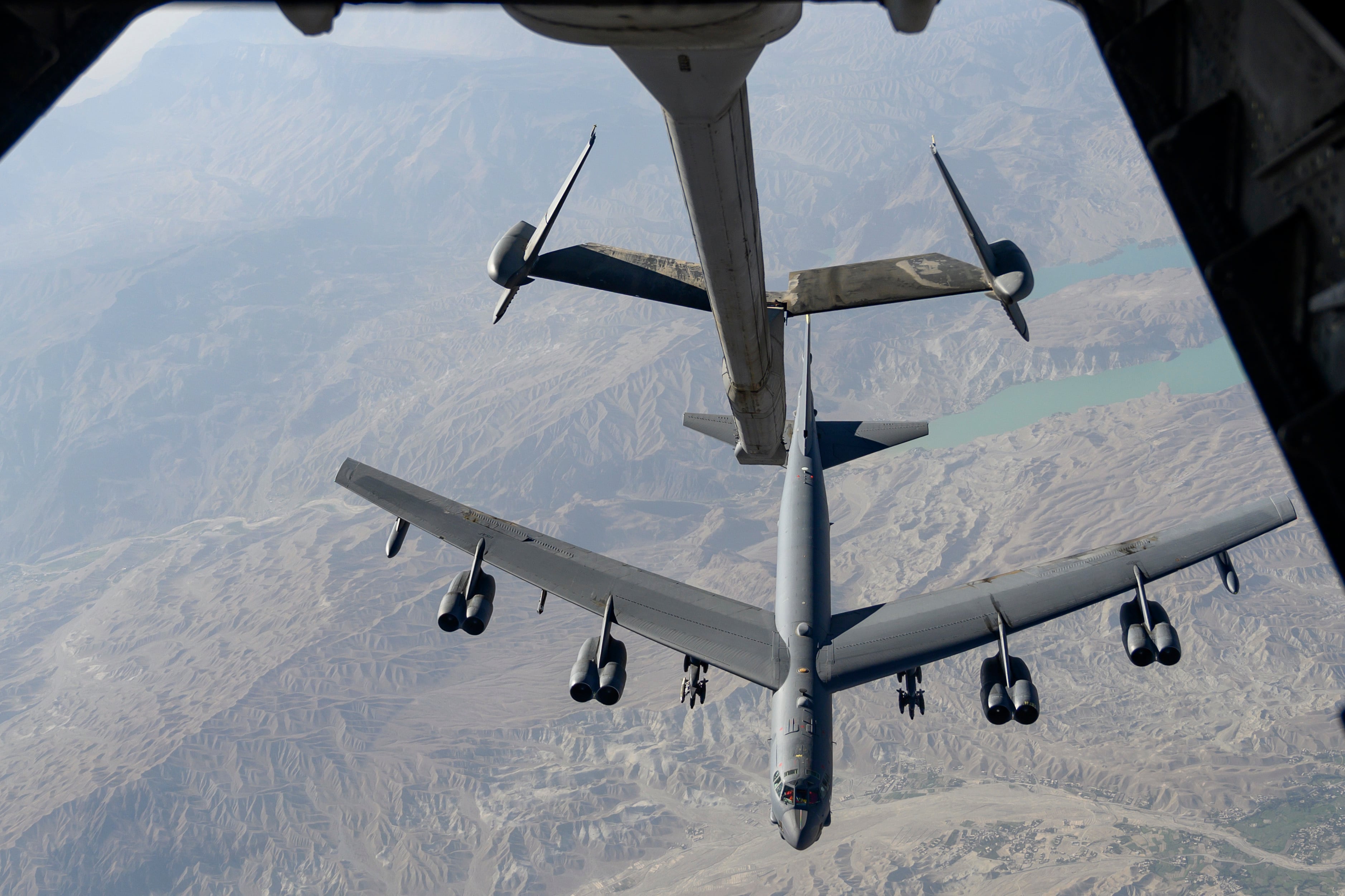 A U.S. Air Force B-52H Stratofortress aircraft approaches a KC-10 Extender aircraft over an undisclosed location in Southwest Asia to receive fuel during a mission on Aug. 13, 2021. (Tech. Sgt. Michelle Y. Alvarez/Air Force)