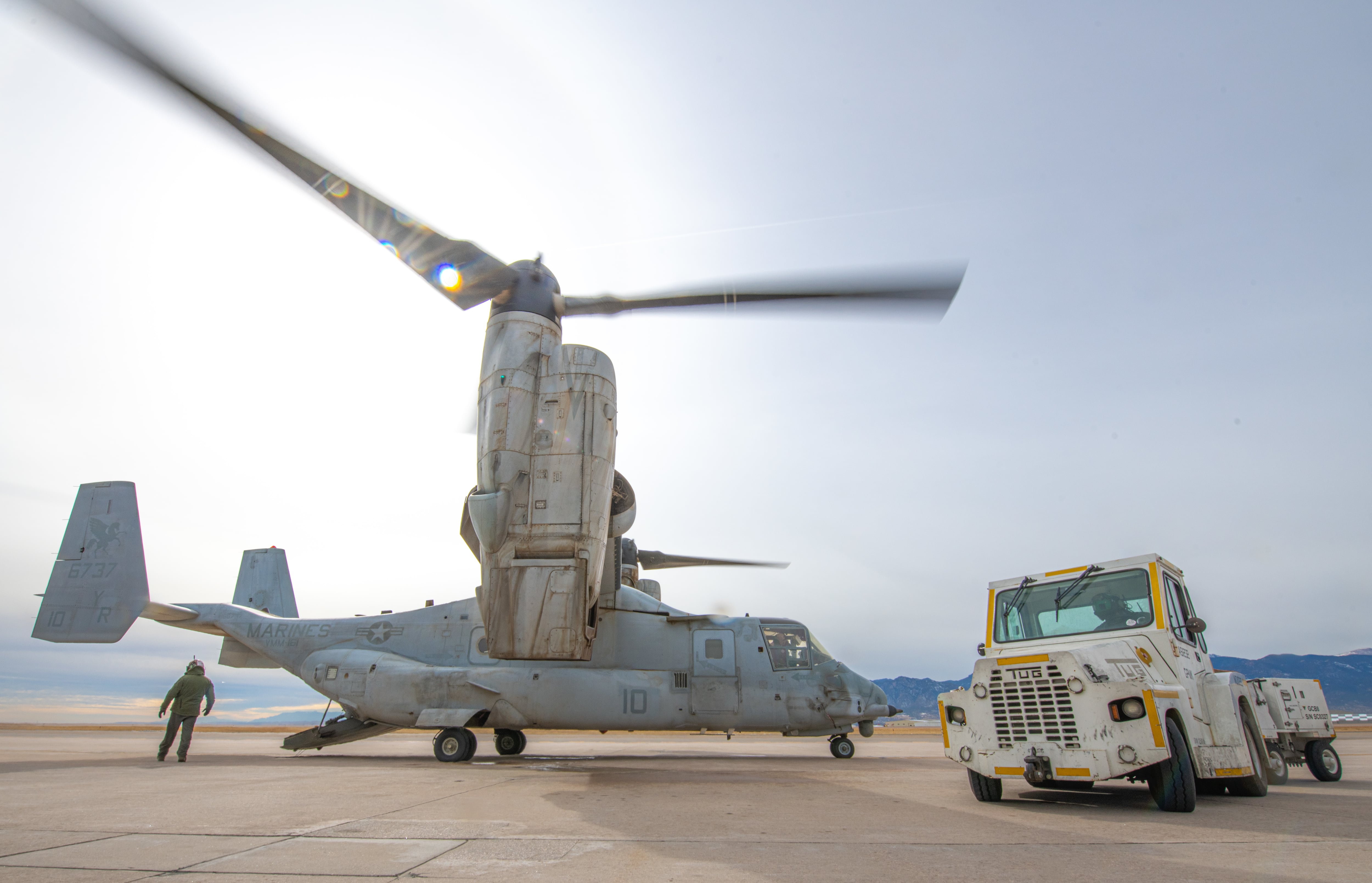 Marines refuel an MV-22B Osprey at Peterson Air Force Base, Colorado, after completing an exercise flight, Jan. 28, 2021.