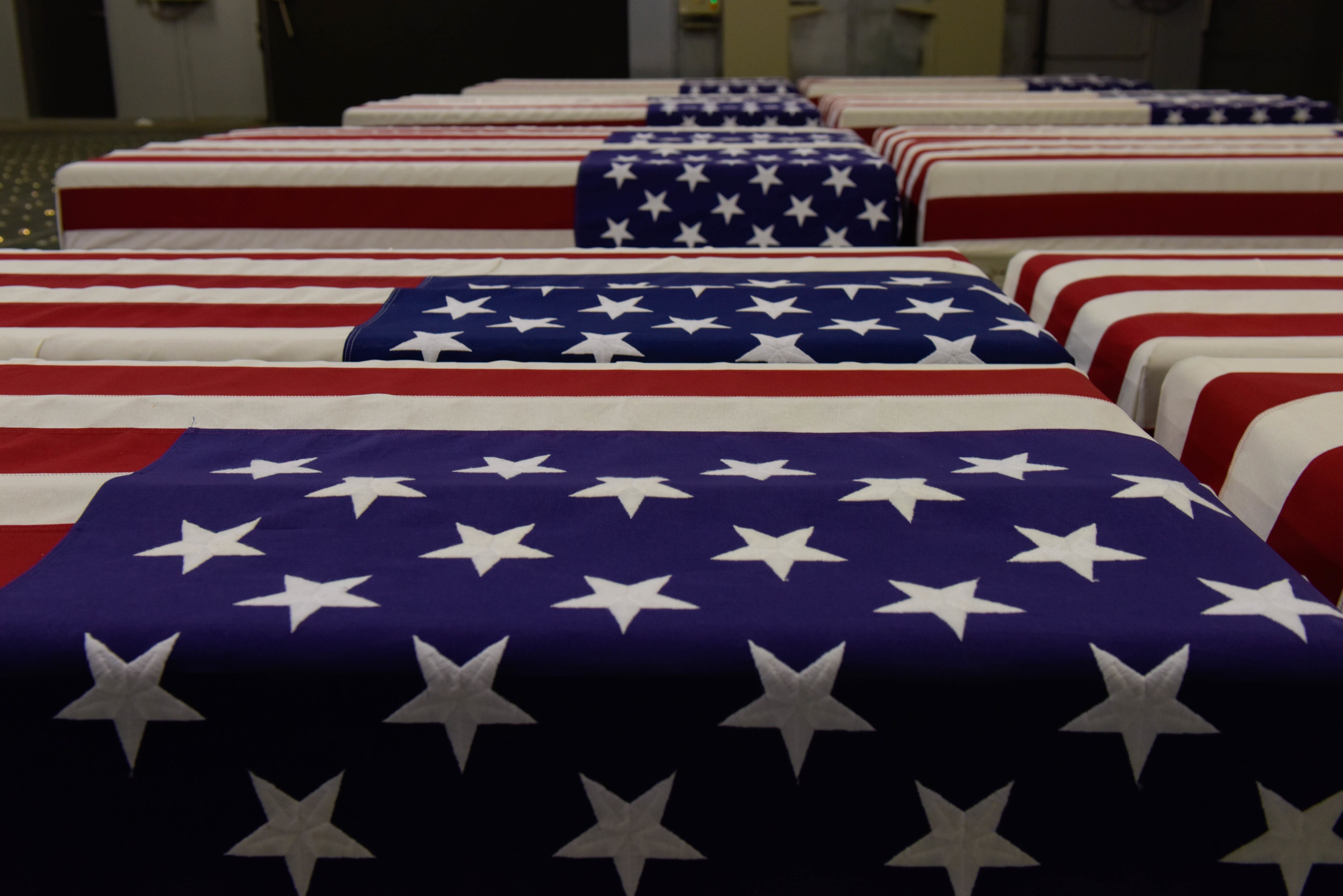 Possible remains of World War II soldiers await transport at Ramstein Air Base, Germany, June 23, 2021.