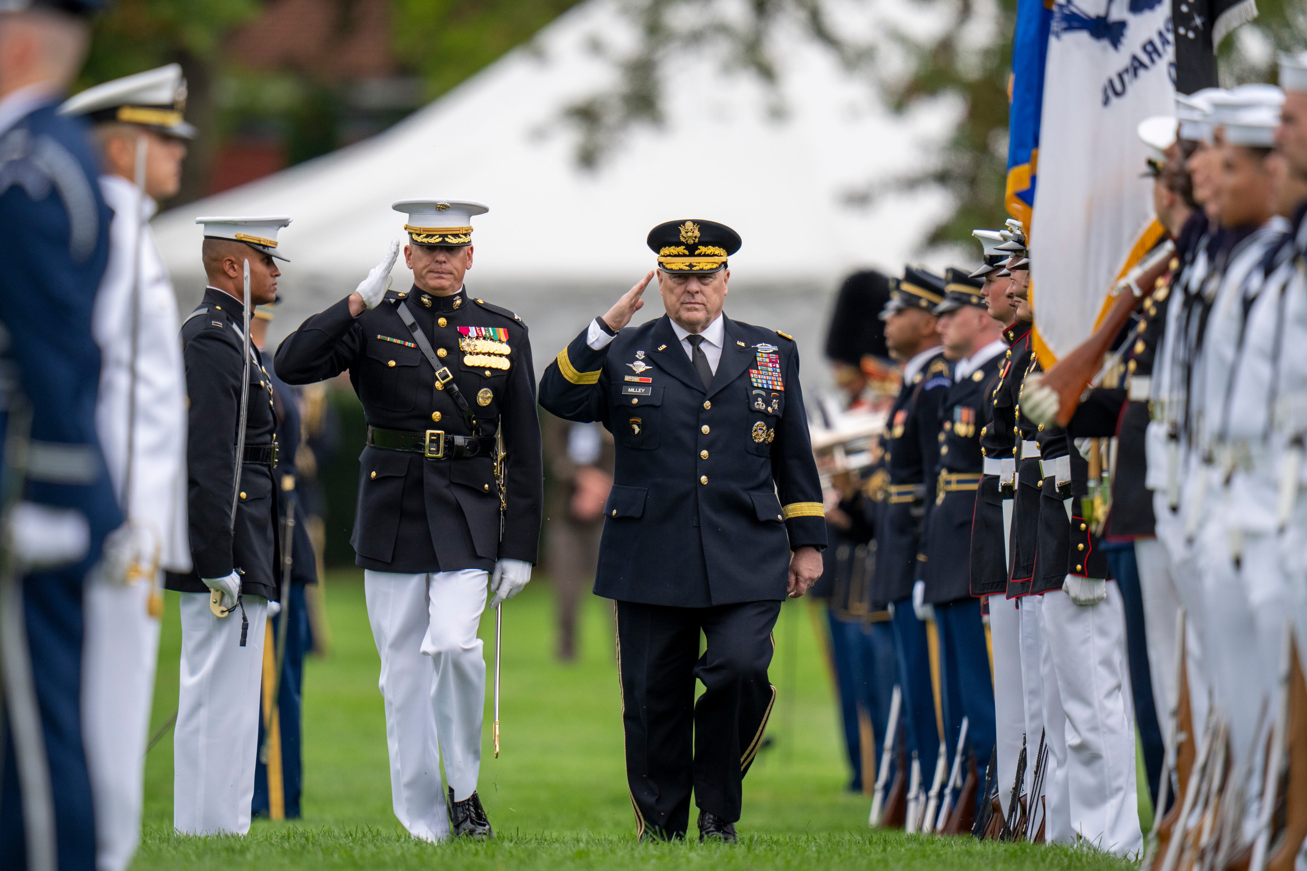 Col. Robert Sucher, Commander 8th and I, Marine Barracks Washington, left, and Joint Chiefs Chairman Gen. Mark Milley salute during an inspection of the troops during an Armed Forces Farewell Tribute in honor of Joint Chiefs Chairman Gen. Mark Milley at Joint Base Myer–Henderson Hall, Friday, Sept. 29, 2023, in Fort Meyer, Va.