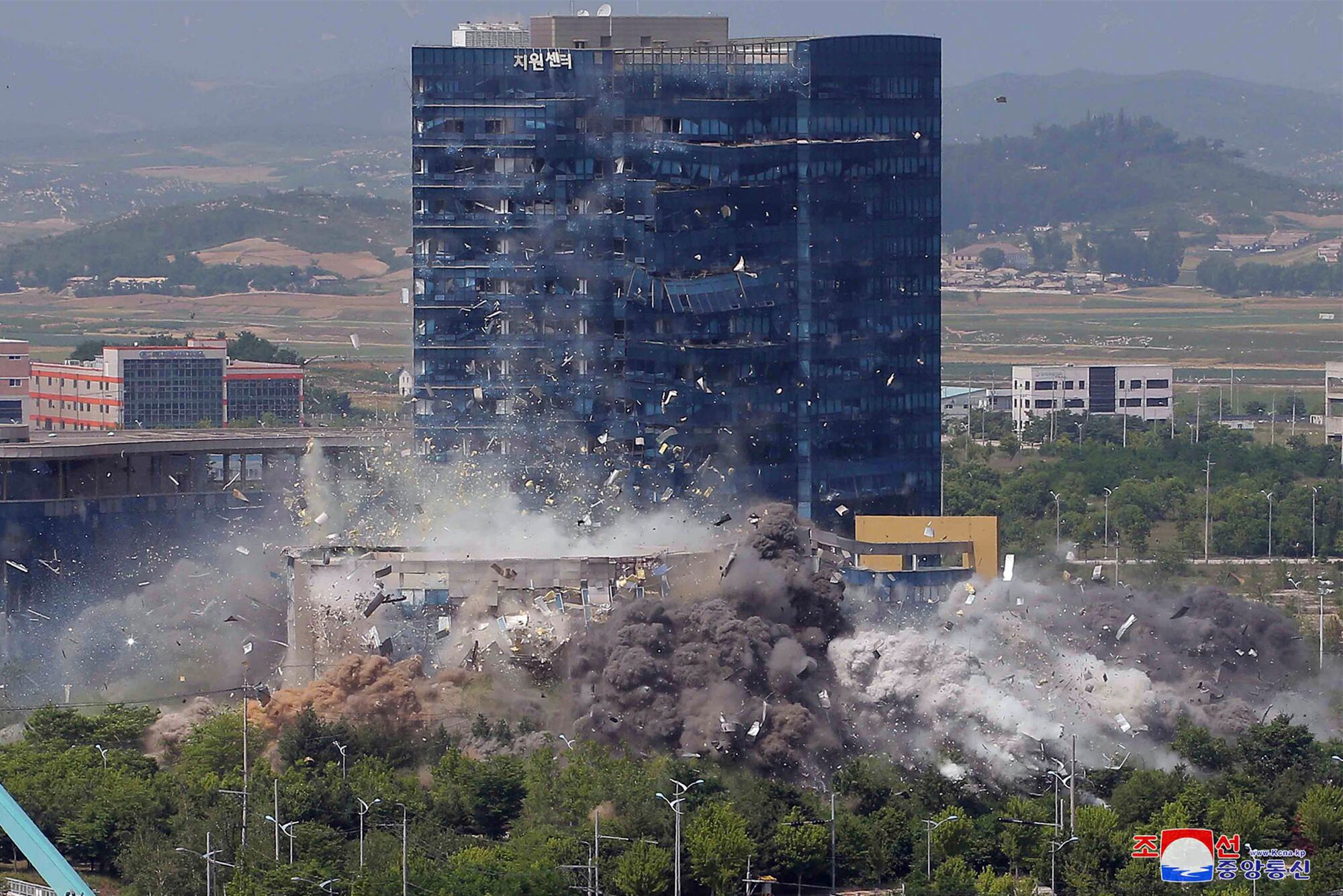 This photo provided by the North Korean government shows the explosion of an inter-Korean liaison office building in Kaesong, North Korea, Tuesday, June 16, 2020.