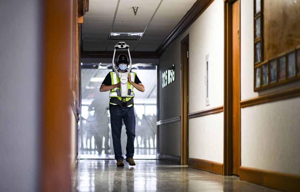 A contractor with the Tyndall Program Management Office demonstrates how to map the interior of a building at Tyndall Air Force Base, Fla., March 26, 2021. Tyndall PMO has been tasked with creating a virtual and augmented reality version of the base which will enable enhanced maintenance, modeling, and simulations while conserving manpower and resources. (Air Force/Staff Sgt. Stefan Alvarez)