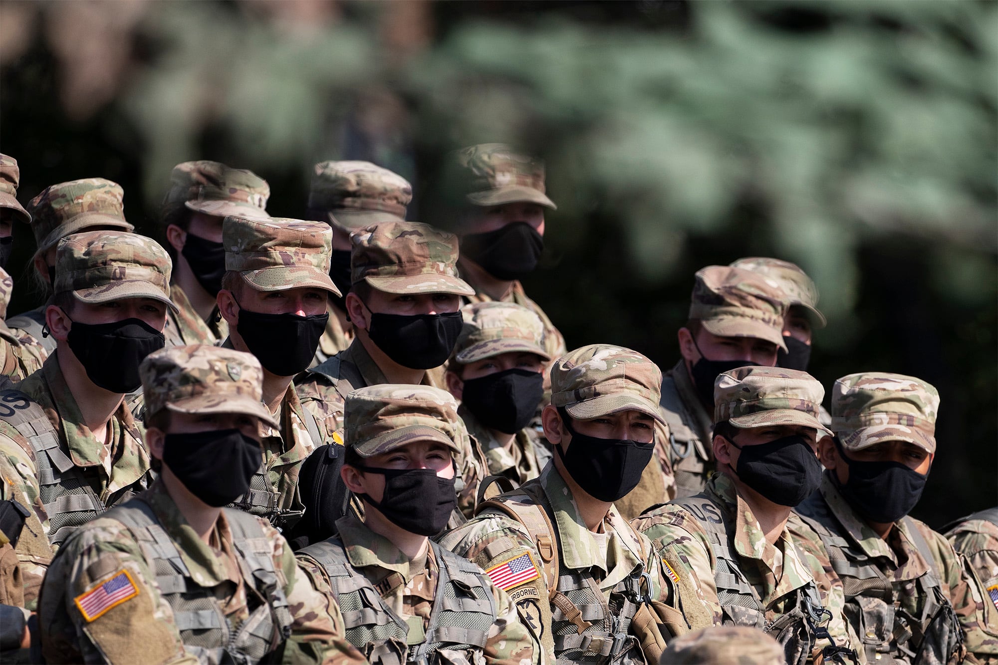 Cadets wear masks as they listen to instructions on firing mortars, Friday, Aug. 7, 2020, at the U.S. Military Academy in West Point, N.Y.