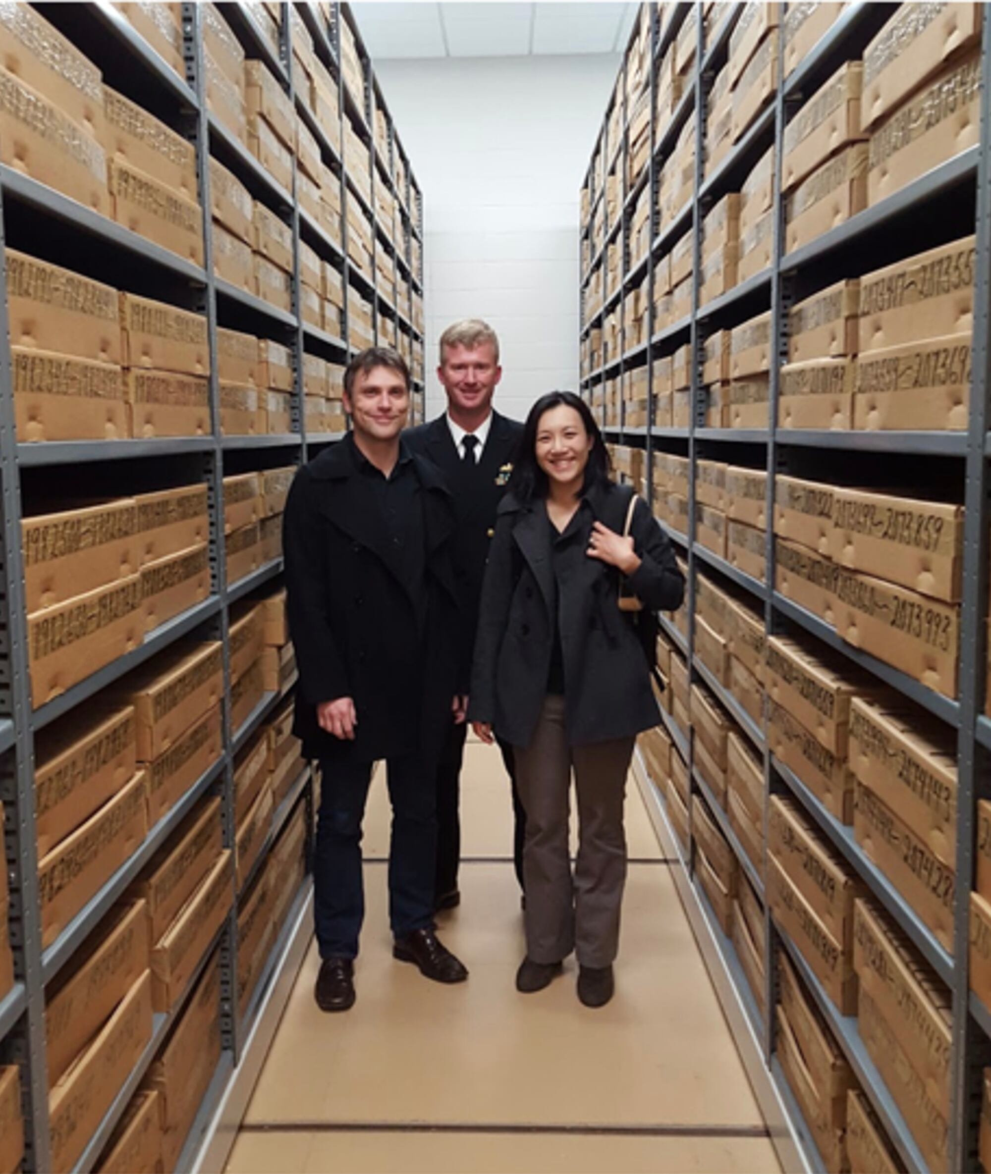 Olson, center, and Google scientists Martin Stumpe and Lily Peng took a private tour of the JPC collection in 2016.