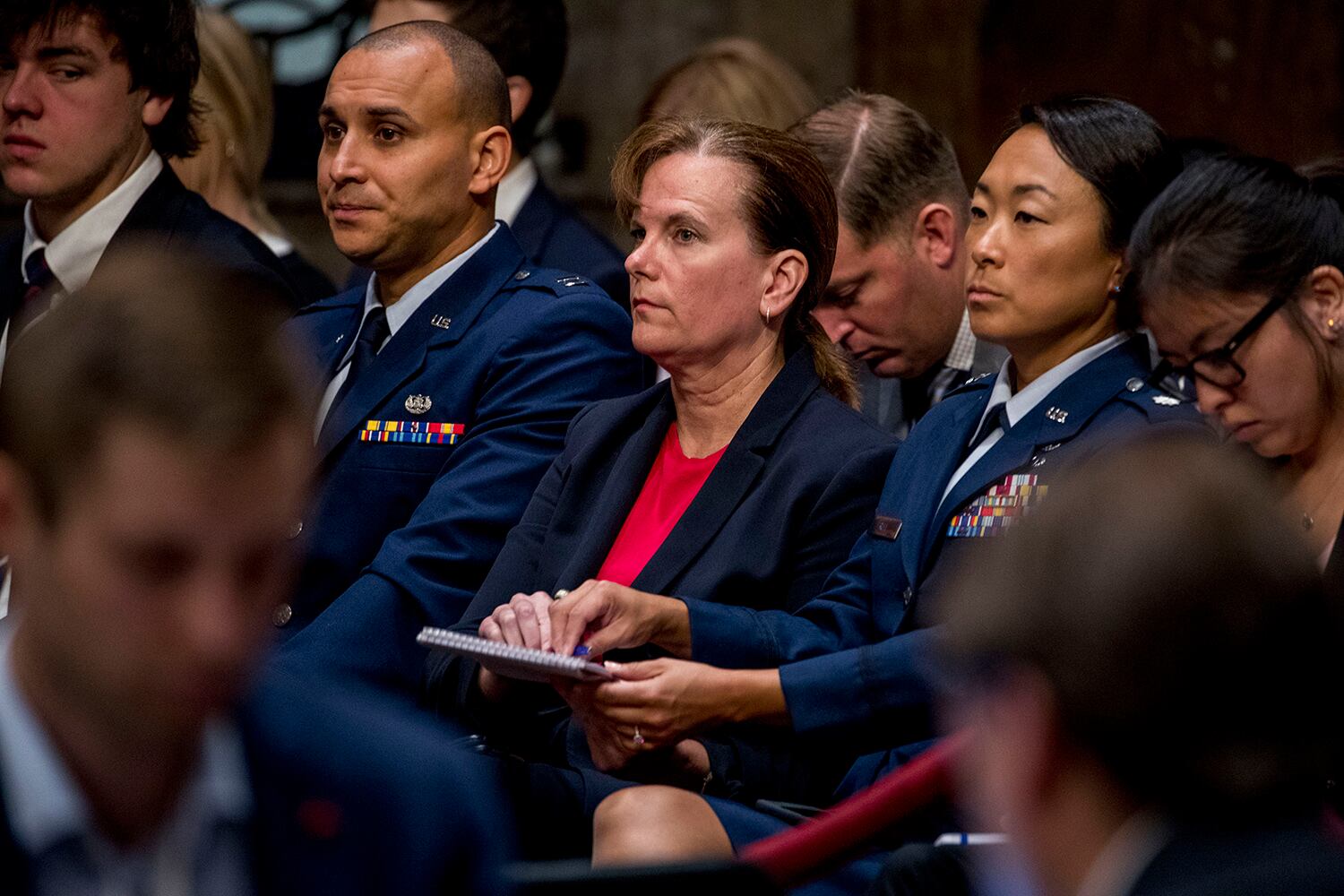 Former aide Army Col. Kathryn Spletstoser sits in the audience as Gen. John Hyten appears before the Senate Armed Services Committee on Capitol Hill in Washington, Tuesday, July 30, 2019, for his confirmation hearing to be vice chairman of the Joint Chiefs of Staff.