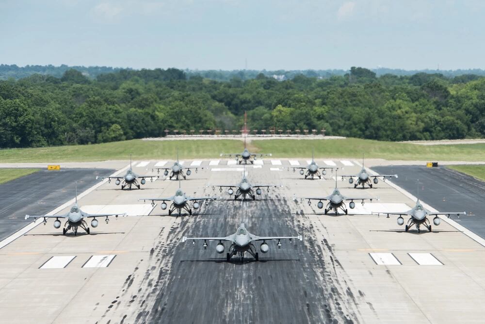 F-16 Fighting Falcons from the 138th Fighter Wing participate in an elephant walk, June 4, 2021, at the Tulsa Air National Guard Base, Okla. The elephant walk was part of a large-scale readiness exercise that was conducted to test the wing's ability to rapidly deploy combat ready forces across the globe. (Tech. Sgt. Rebecca Imwalle/Air National Guard)