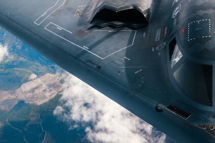 A 509th Bomb Wing B-2 Spirit refuels from a 351st Aerial Refueling Squadron KC-135 Stratotanker during the Bomber Task Force training exercise over the United Kingdom, Aug. 29, 2019.