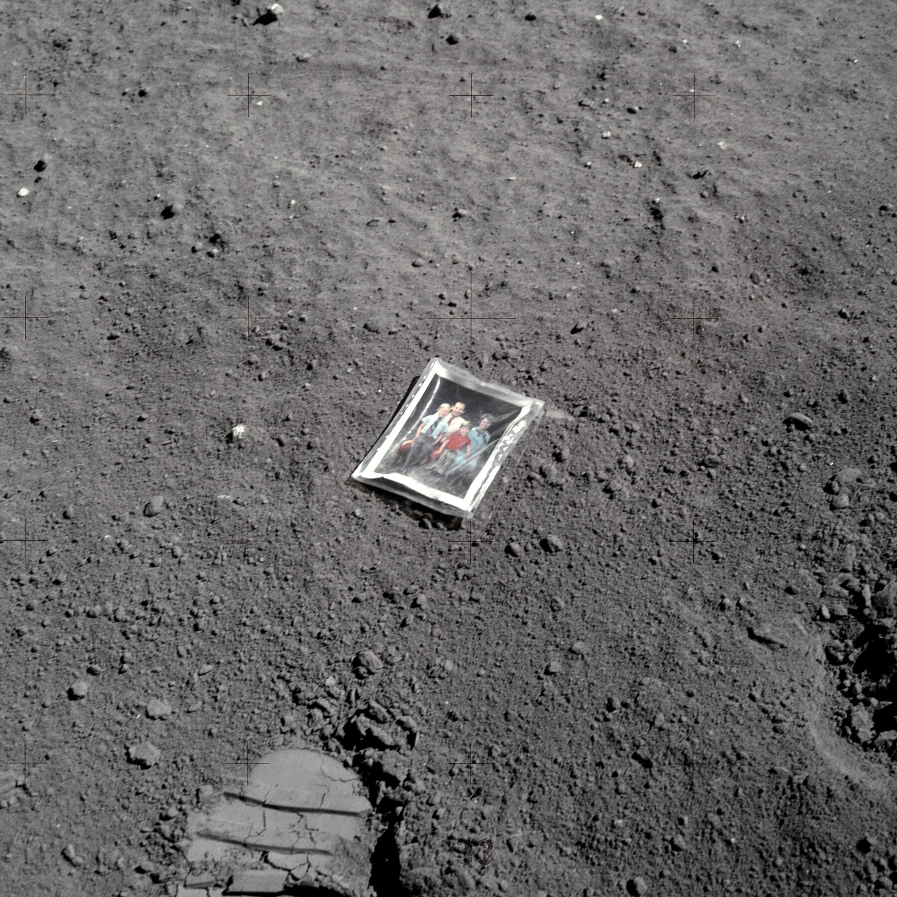 An image of a family photo that Apollo 16 astronaut and Air Force Lt. Col. Charlie Duke left on the moon in April 1972. (NASA/Johnson Space Center/Arizona State University/Andy Saunders)