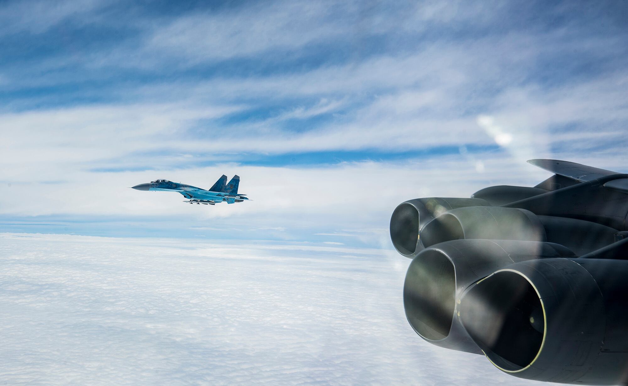 A Ukraine SU-27 integrates with a U.S. B-52H Stratofortress during a Bomber Task Force Europe mission, Sept. 4, 2020.