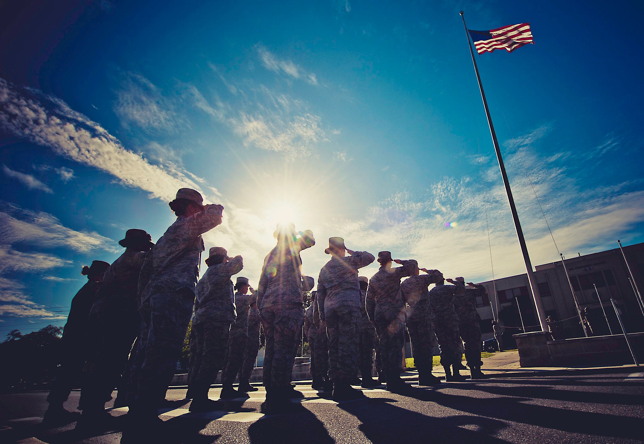 An all-female flight and flag detail perform the retreat ceremony in honor of Women's History Month at Eglin Air Force Base, Fla., March 29, 2012.