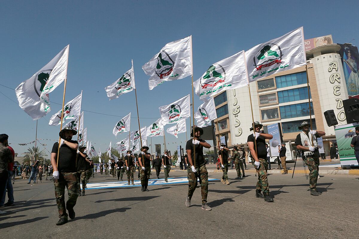 Iraqi Popular Mobilization Forces march in Baghdad, Iraq.