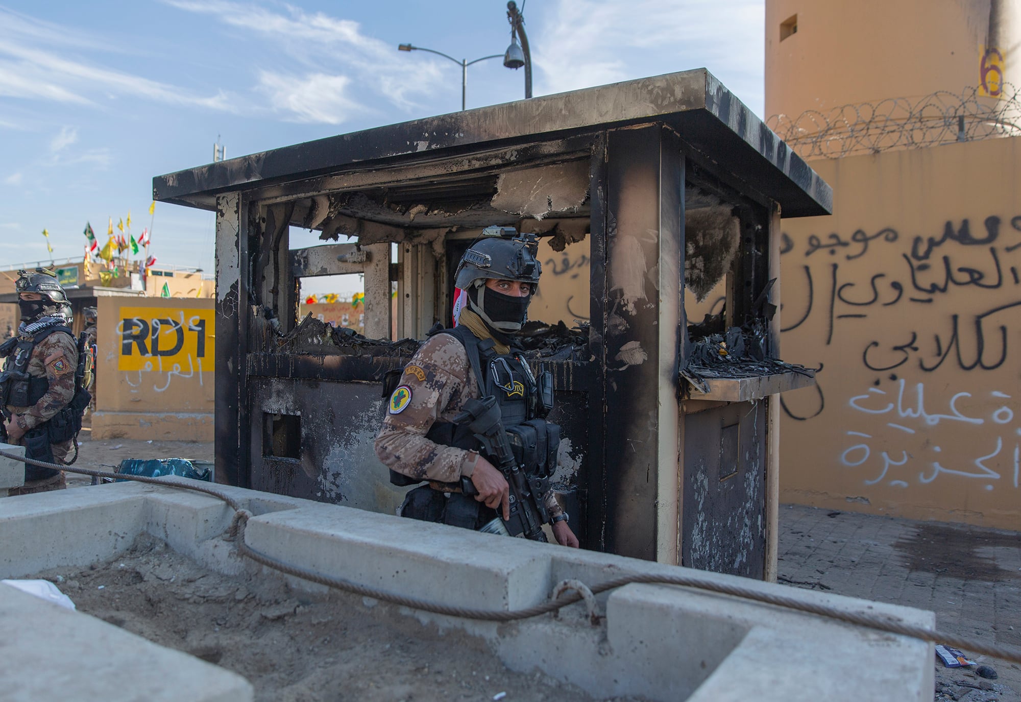 In this Jan. 1, 2020, file photo, Iraqi army soldiers are deployed in front of the U.S. Embassy, in Baghdad, Iraq.