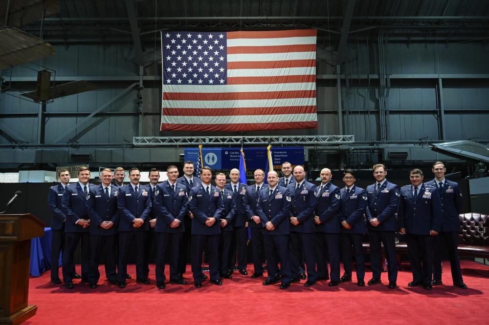 The crews of AC-130J Ghostrider gunships "Shadow 77" and "Shadow 78," 73rd Expeditionary Special Operations Squadron, Joint Special Operation Air Component-Central, receive Mackay Trophy 2021 awards for their support of Operation Freedom's Sentinel, which provided close-air support for 2,000 American evacuating the embassy in Kabul, Afghanistan, in August 2021. The awards ceremony took place at the National Museum of the U.S. Air Force, Wright-Patterson Air Force Base, Ohio, on Dec. 7, 2022. (Ty Greenlees/Air Force)