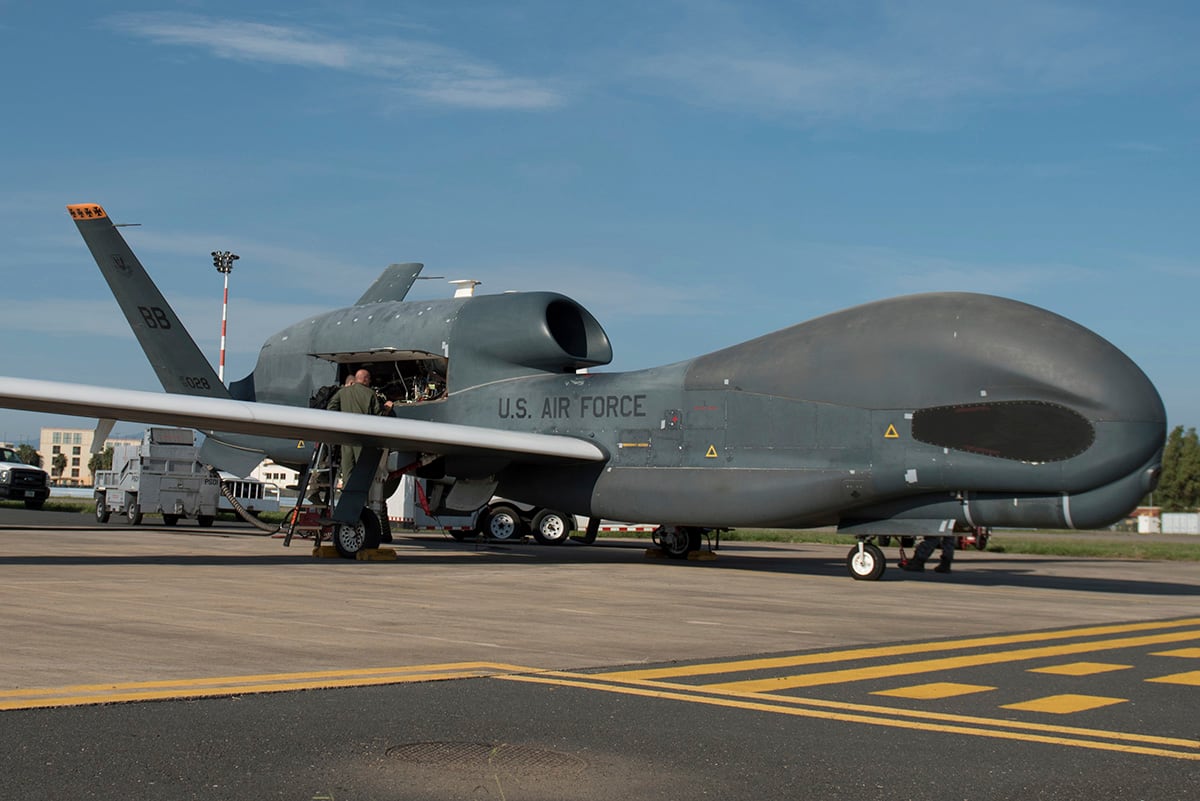 members of the 7th Reconnaissance Squadron prepare to launch an RQ-4 Global Hawk at Naval Air Station Sigonella, Italy.