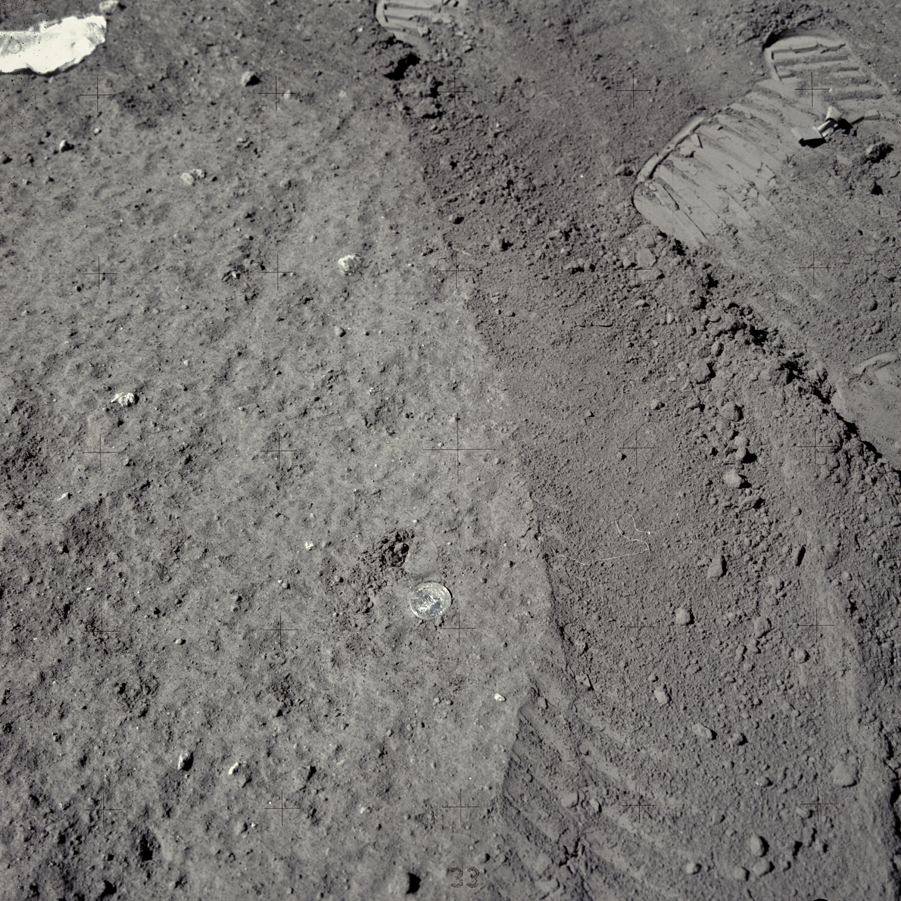 An image of an Air Force 25th anniversary celebration coin on the moon during the Apollo 16 mission. (NASA/Johnson Space Center/Arizona State University/Andy Saunders)