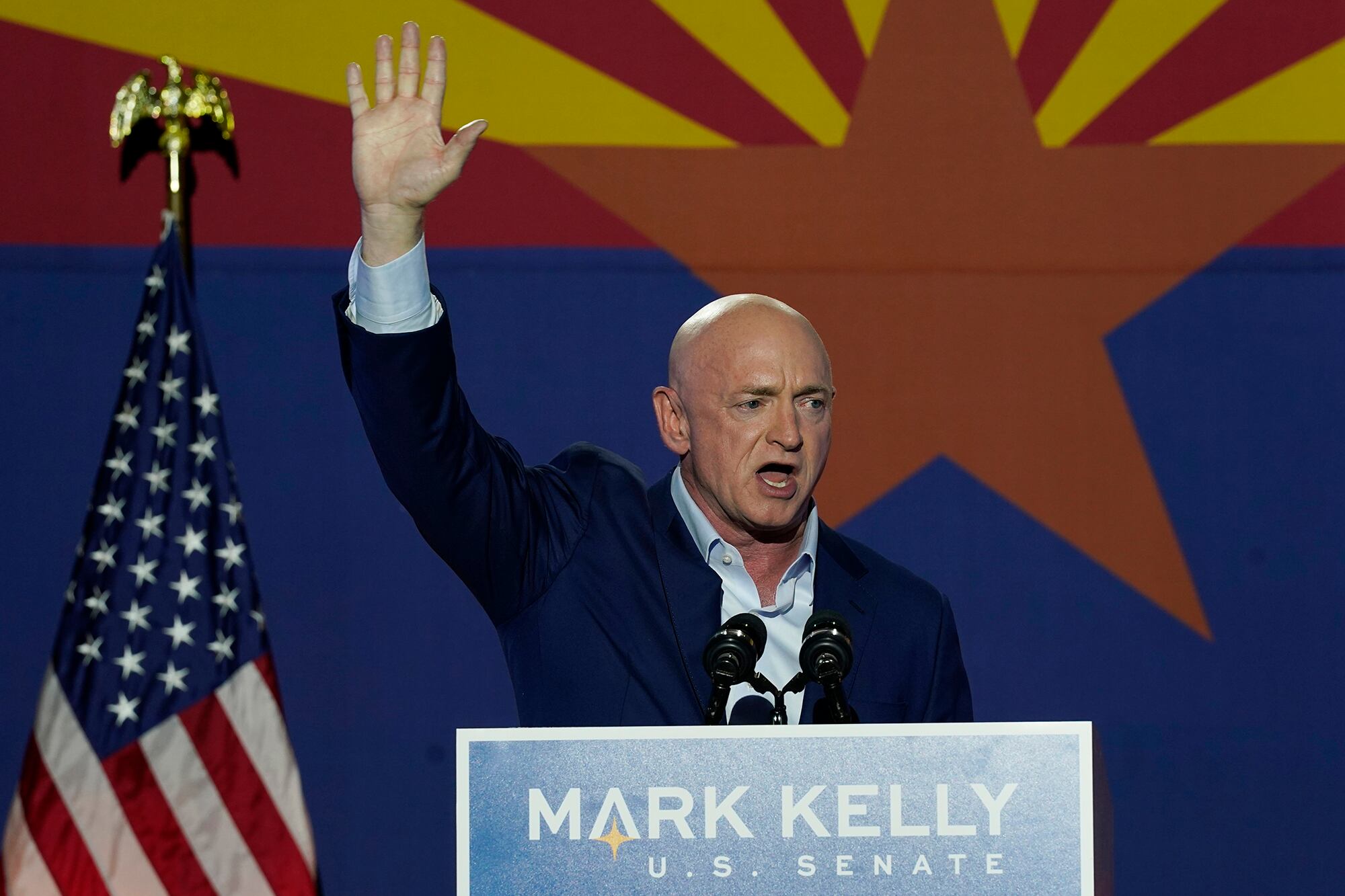 Mark Kelly, Arizona Democratic candidate for U.S. Senate, waves to supporters as he speaks during an election night event Tuesday, Nov. 3, 2020, in Tucson, Ariz.