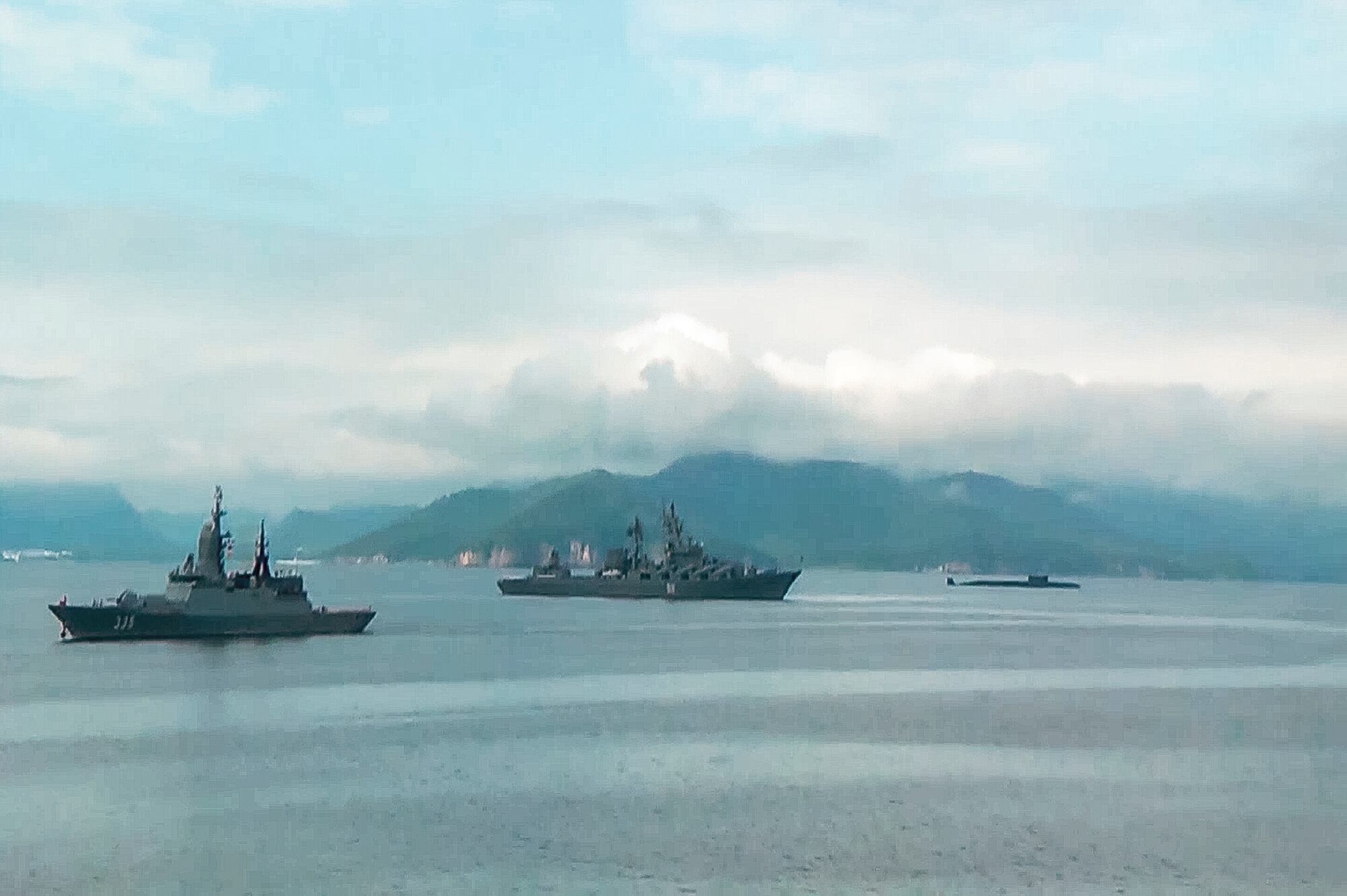 In this undated video grab provided by Russian Defense Ministry Press Service, Russian warships take part in maneuvers in the Bering Sea.