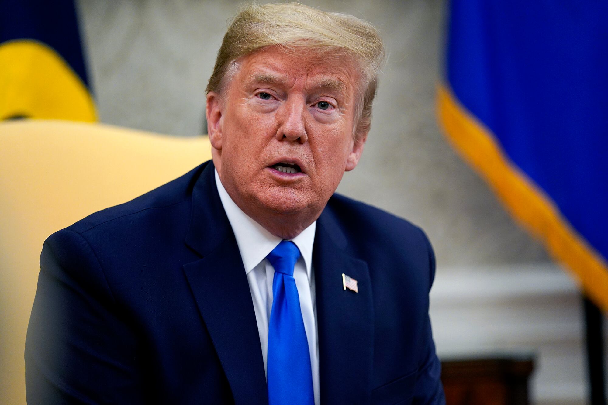 President Donald Trump speaks during a meeting with Gov. Kim Reynolds, R-Iowa, in the Oval Office of the White House