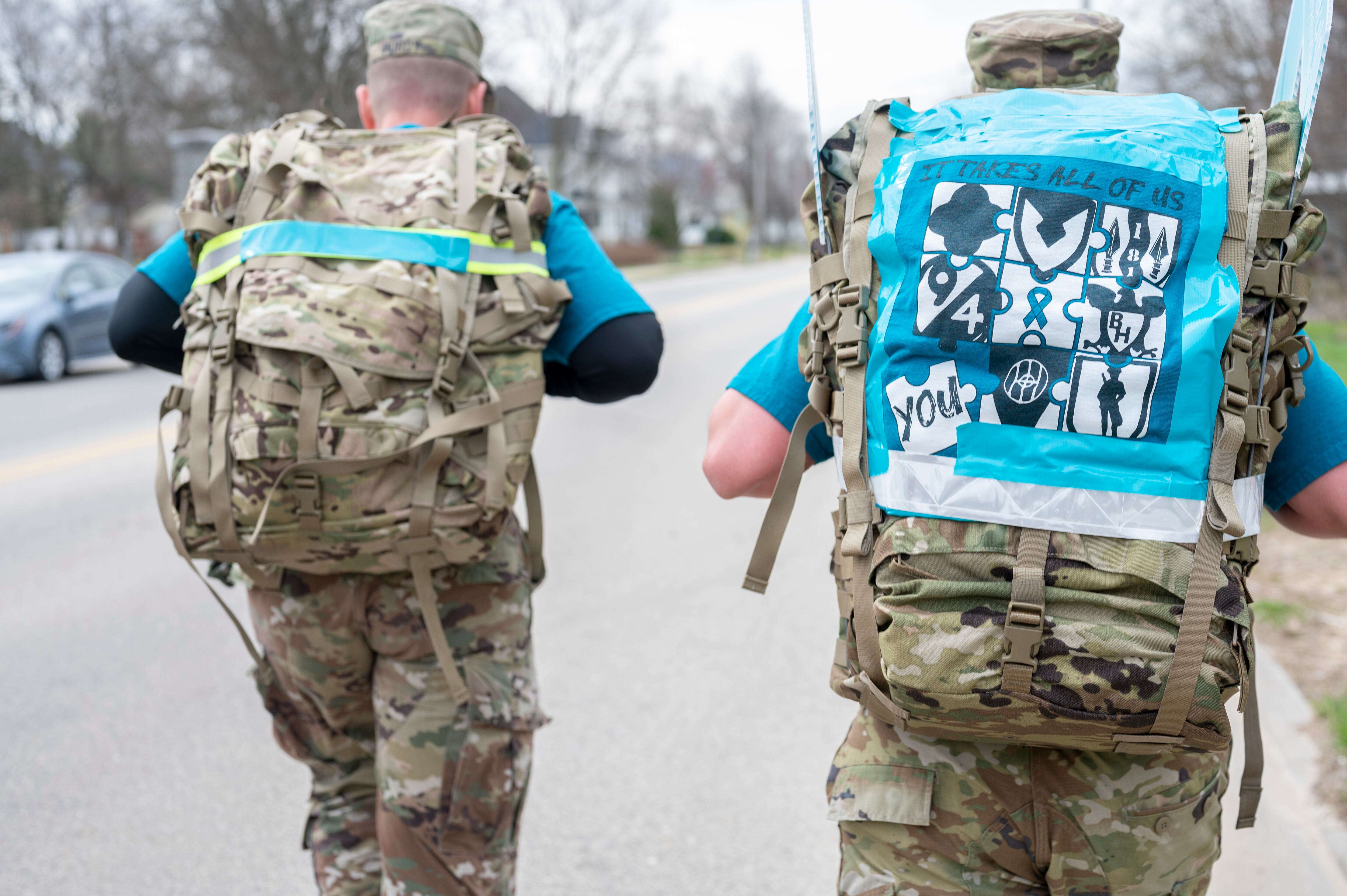 Soldiers lead a Sexual Assault Awareness and Prevention Month Ruck March April 29, 2022, in Sparta, Wis.