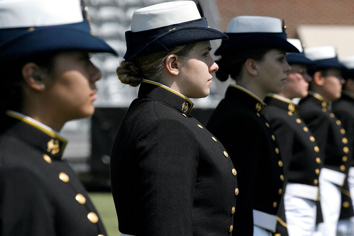 In this May 22, 2019, file photo, female cadets at the United States Coast Guard Academy line up during commencement in New London, Conn.