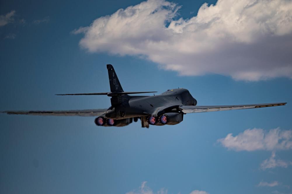 Rear view of a B-1B Lancer bomber jet in flight