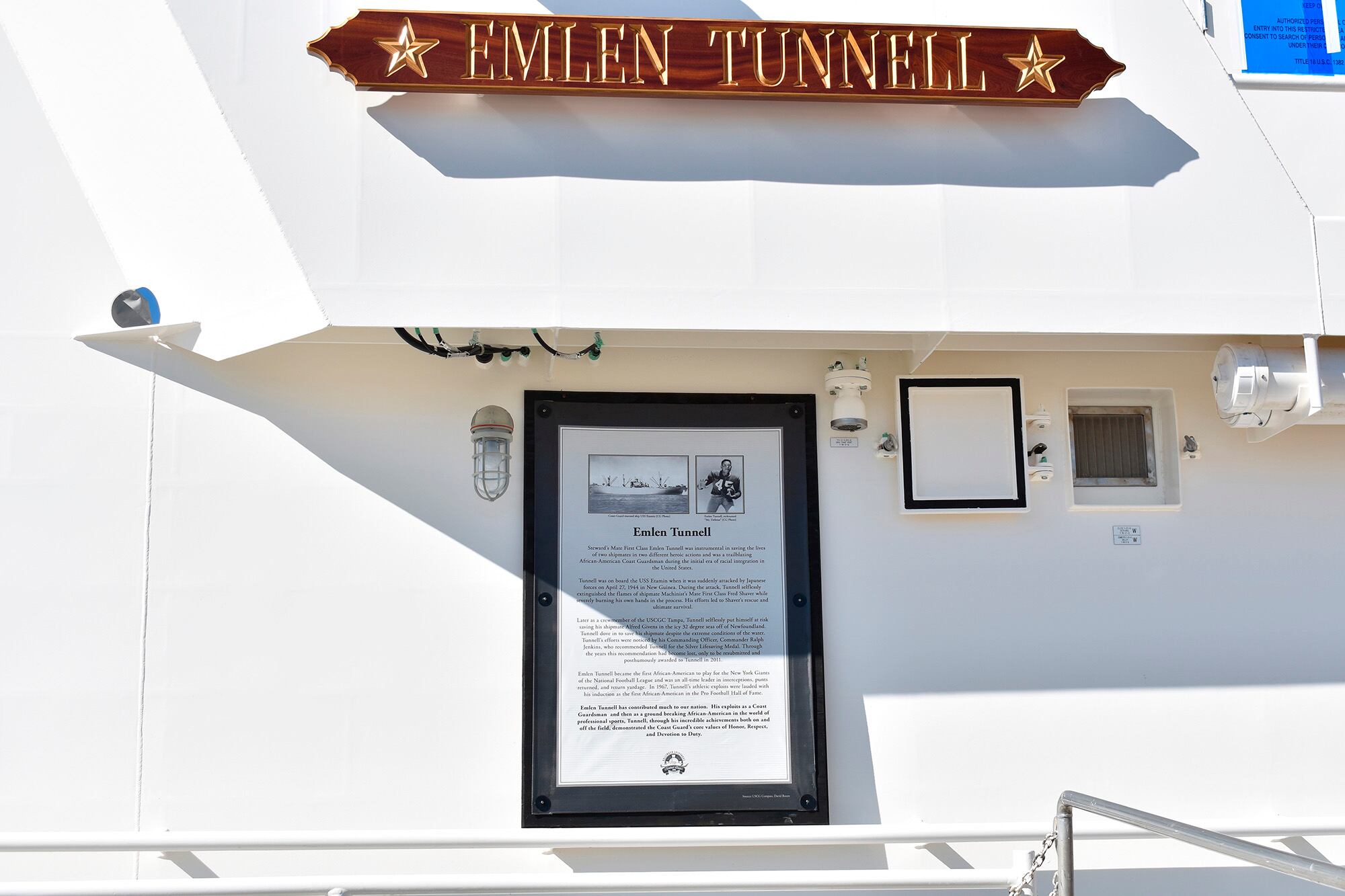 This undated photo provided by the United States Coast Guard shows a name plate and tribute plaque for Emlen Tunnell on a U.S. Coast Guard cutter docked in Bollinger Shipyard, Lockport, La.