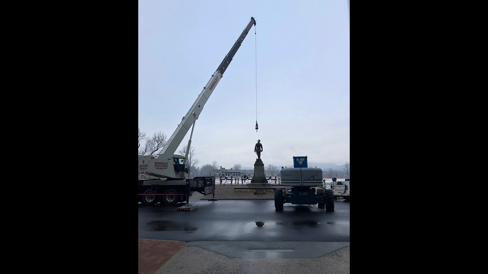 Crews prepare to remove a statue of Confederate Gen. Thomas "Stonewall" Jackson from the campus of the Virginia Military Institute on Monday, Dec. 7, 2020, in Lexington, Va.