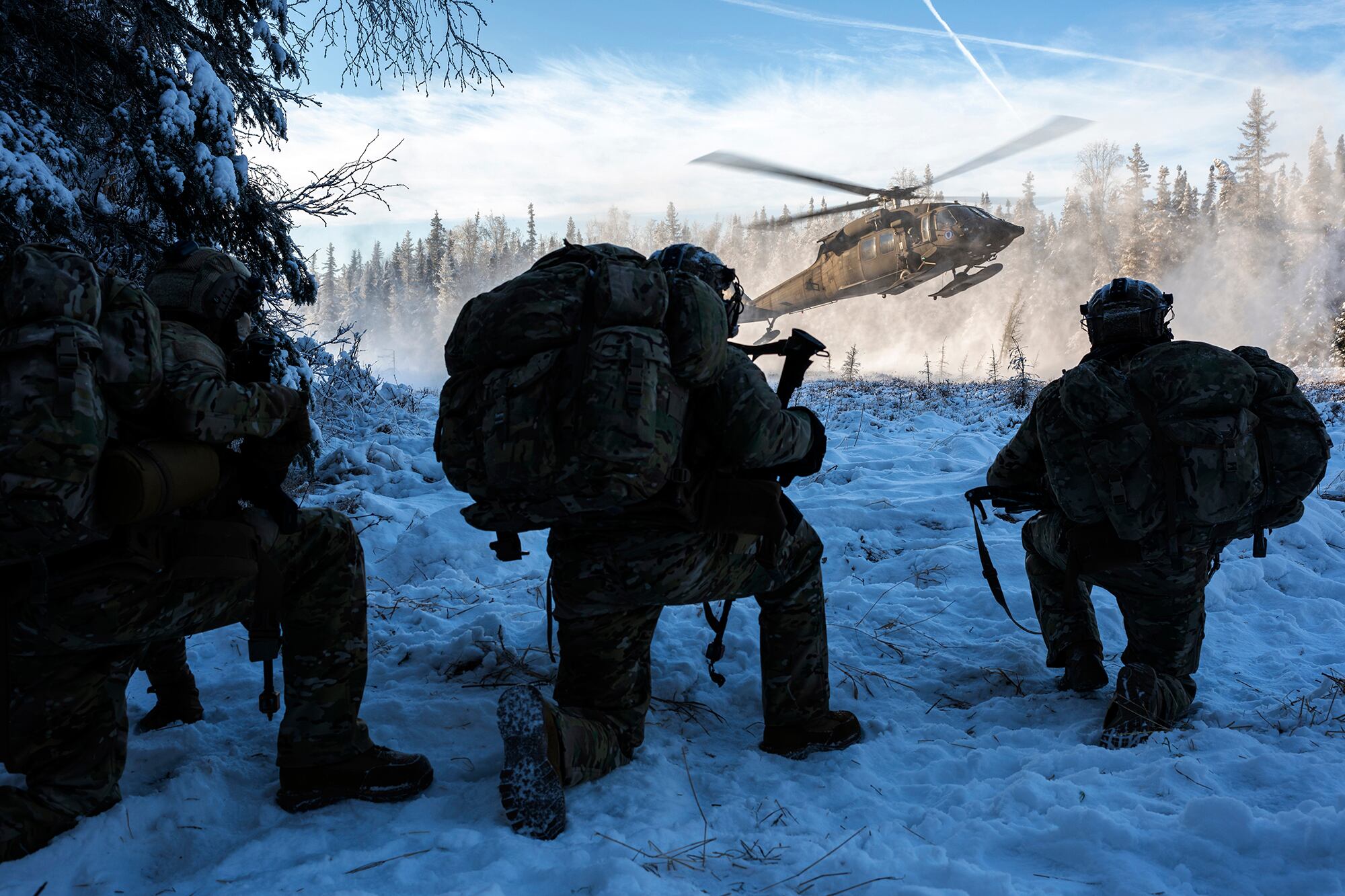 An Alaska Army National Guard UH-60L Black Hawk helicopter lands to pick up Air Force special warfare airmen during small-unit training at Joint Base Elmendorf-Richardson, Alaska, Nov. 18, 2020.