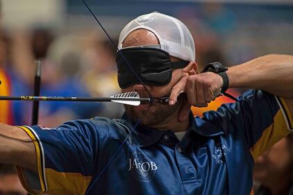 Coast Guard Maritime Enforcement Specialist 2nd Class Jacob Cox competes for Team Navy in archery at the 2019 Department of Defense Warrior Games on June 24 in Tampa, Fla.