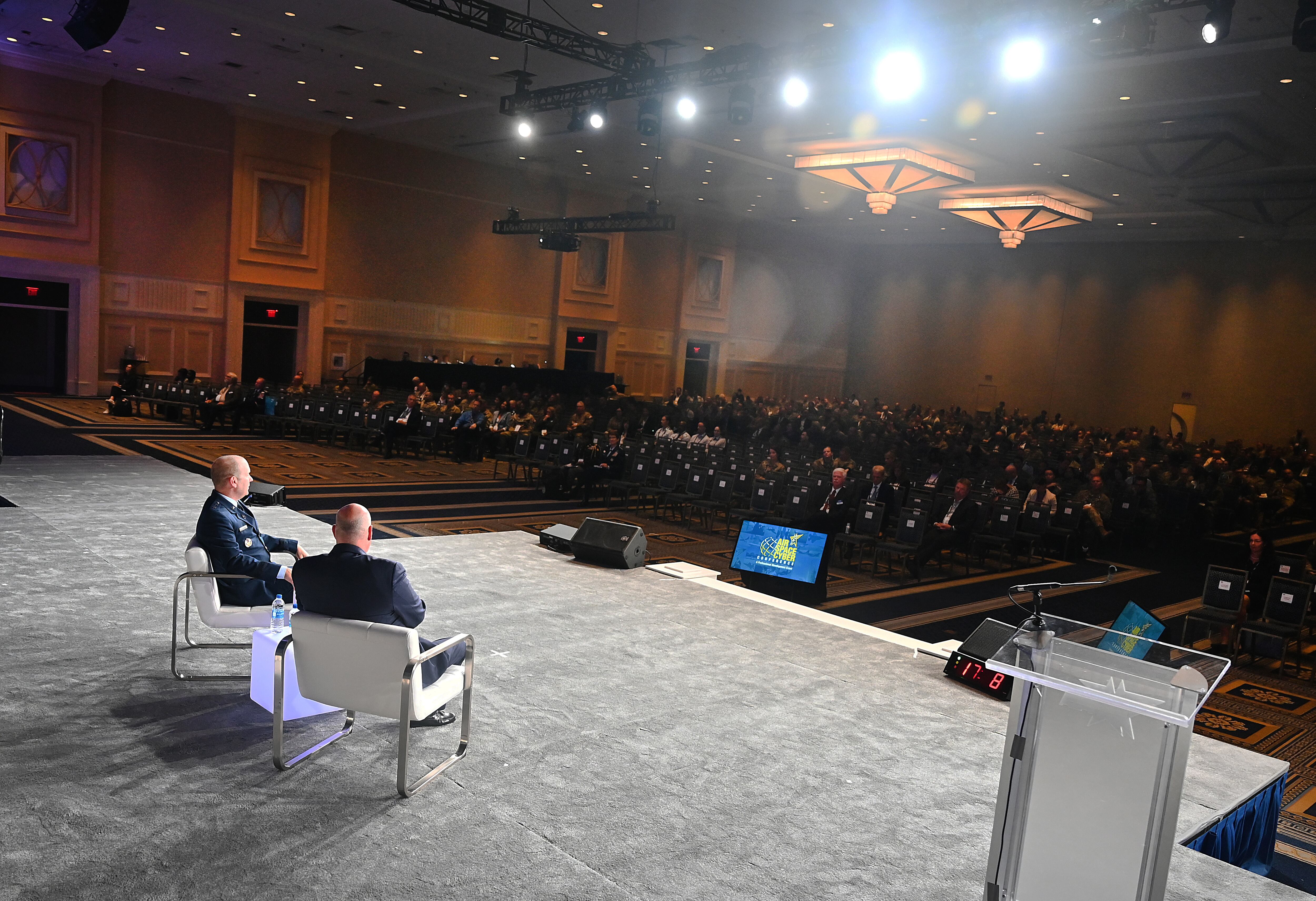 Audience members listen to Space Force Maj. Gen. Douglas A. Schiess address current and future space operations at Air Force Association’s 2022 Air, Space, & Cyber Conference in National Harbor, Maryland, September 19, 2022.