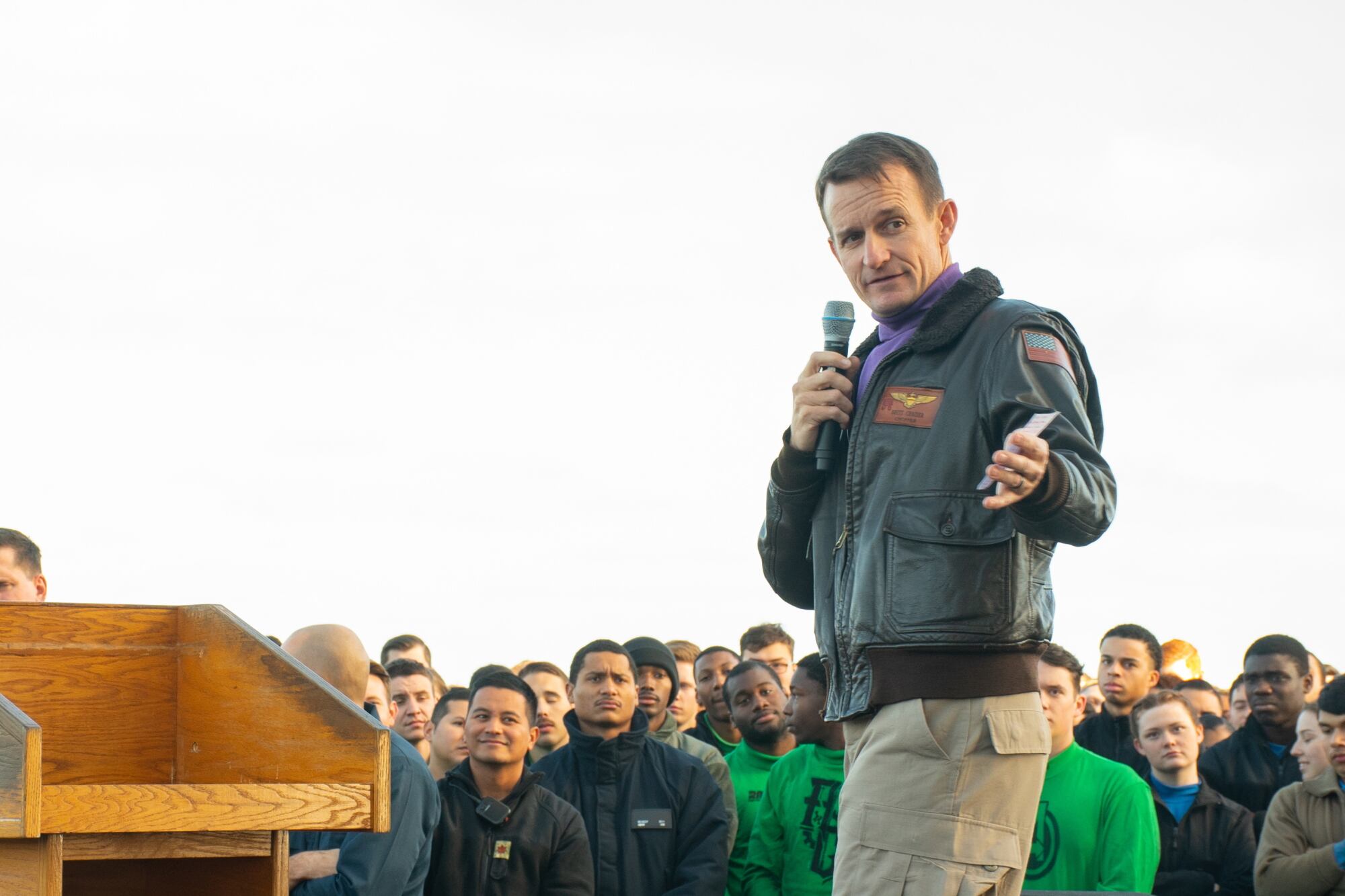 Capt. Brett Crozier, then-commanding officer of the aircraft carrier USS Theodore Roosevelt (CVN 71), gives remarks during an all-hands call on the ship’s flight deck Dec. 15, 2019.