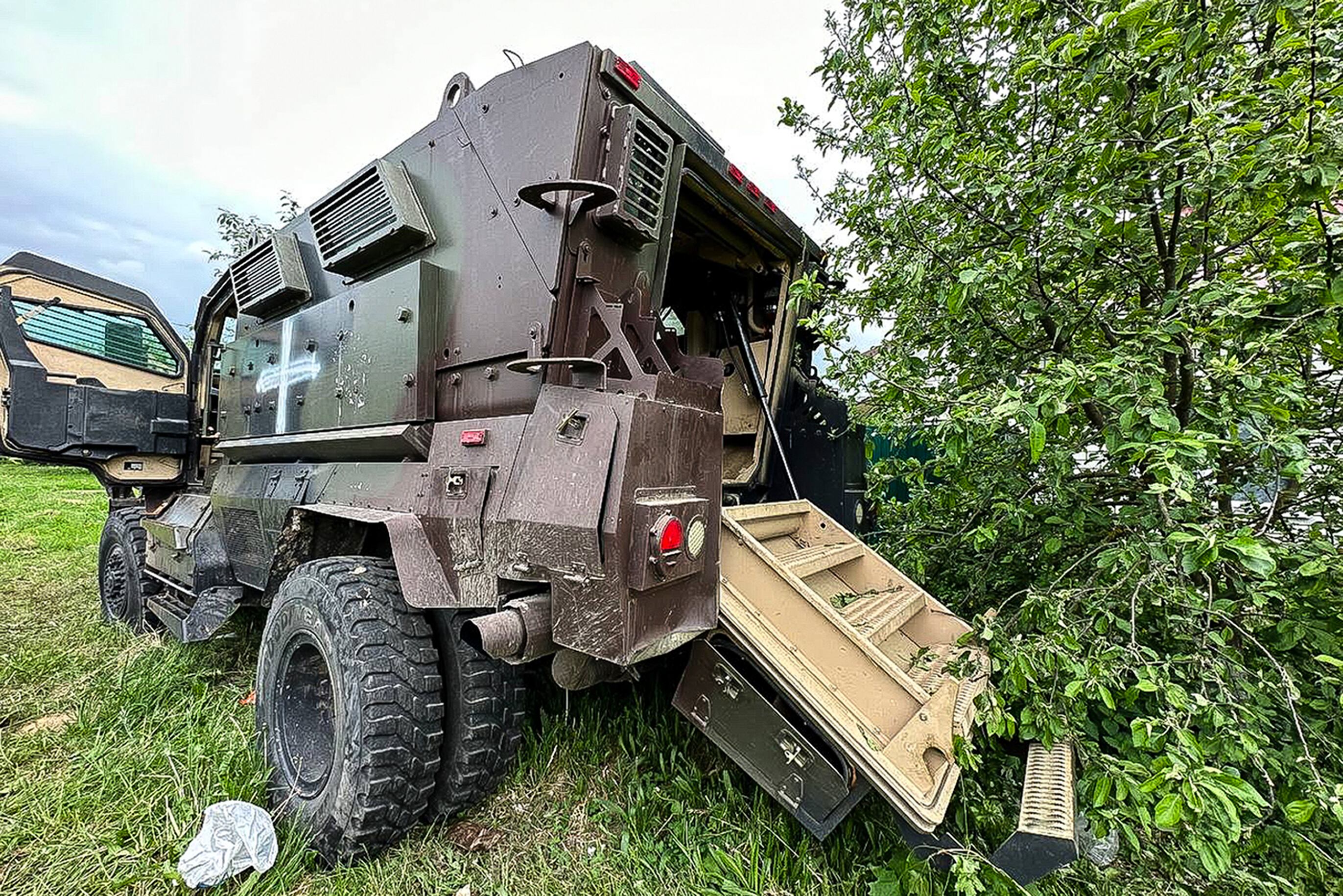 In this handout photo released by Belgorod region governor Vyacheslav Gladkov's telegram channel on Tuesday, May 23, 2023, a damaged armored military vehicle is seen after fighting in Russia's western Belgorod region on Tuesday.