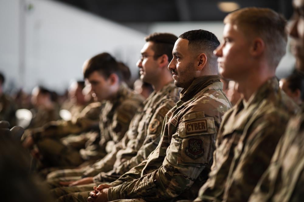 Airmen assigned to the 6th Air Refueling Wing listen to Chief Master Sergeant of the Air Force JoAnne S. Bass during an all-call at MacDill Air Force Base, Florida, Aug. 4, 2022. (Airman 1st Class Joshua Hastings/Air Force)