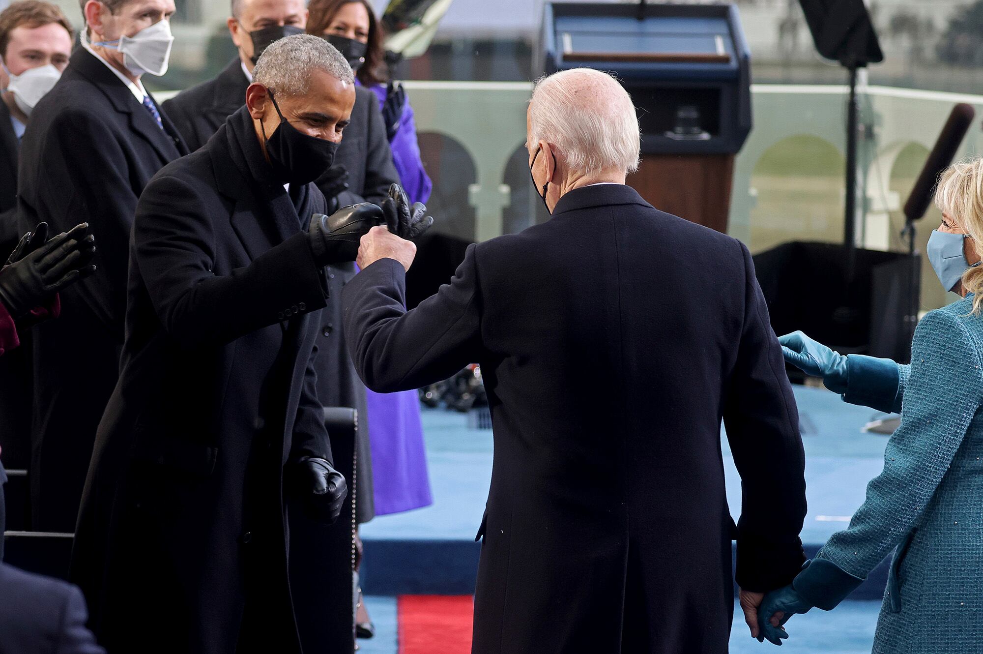 President-elect Joe Biden bumps fists with former President Barack Obama during Biden's inauguration, Wednesday, Jan. 20, 2021, at the U.S. Capitol in Washington.