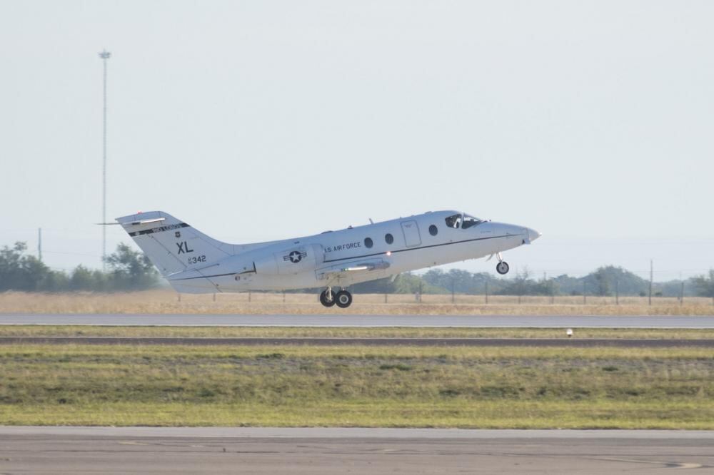 A T-1 Jayhawk takes off on the runway at Laughlin Air Force Base, Texas, Oct. 5, 2022. Laughlin trains the most pilots of any training base in the Air Force and is dedicated to producing combat-ready airmen, pilots and leaders. (Airman 1st Class Kailee Reynolds/Air Force)