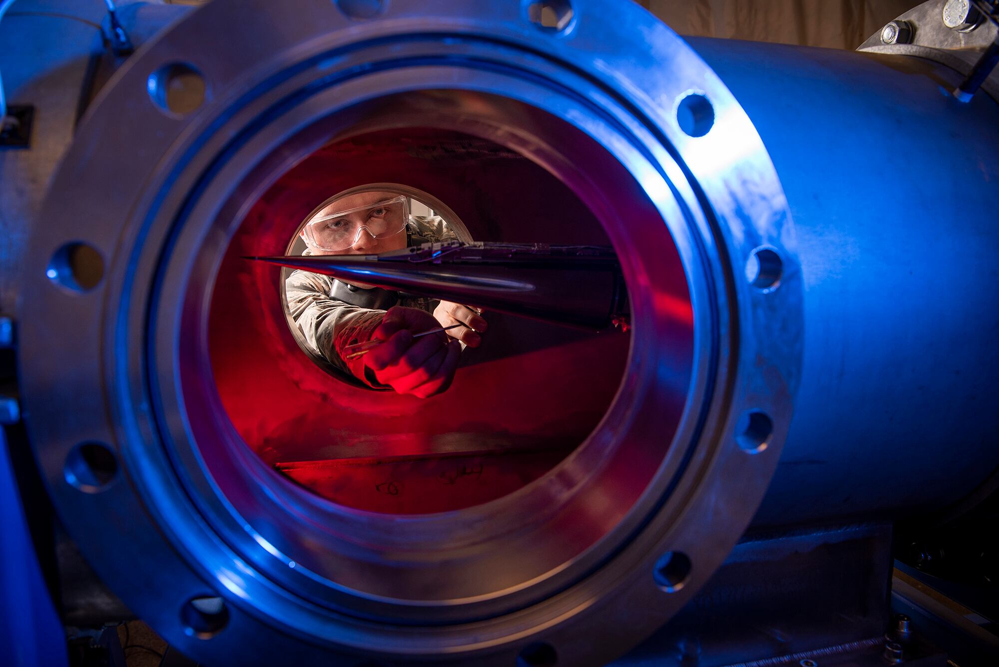 In this Jan. 31, 2019, image provided by the U.S. Air Force Academy, Cadet 2nd Class Eric Hembling uses a Ludwieg Tube to measure the pressures, temperatures, and flow field of various basic geometric and hypersonic research vehicles at Mach 6 in the United States Air Force Academy's Department of Aeronautics, in Colorado Springs, Colo.