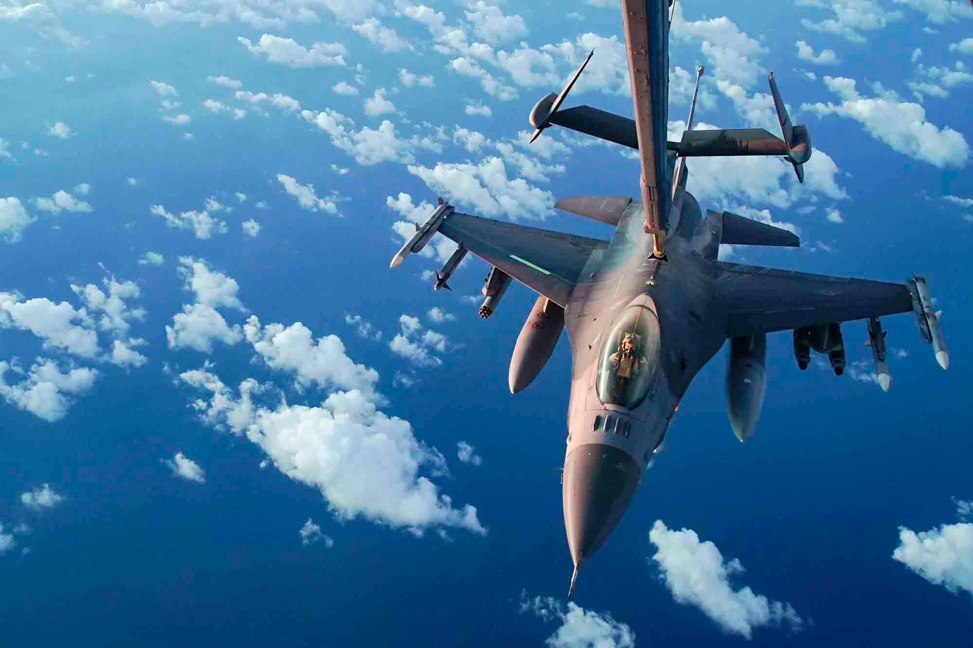 A U.S. Air Force F-16 Fighting Falcon receives fuel from a U.S. Air Force KC-10 Extender during an n-air refueling mission supporting Operation Octave Quartz with armed over-watch in Africa, Jan. 9, 2020.